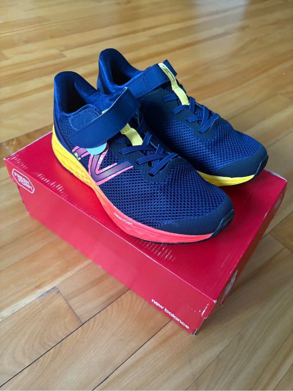 New Balance Navy Kids Sneakers with Yellow & Orange Accents